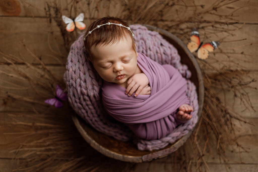Safe and cozy newborn photography setup styled by Arielle Elizabeth Photography in East Jordan